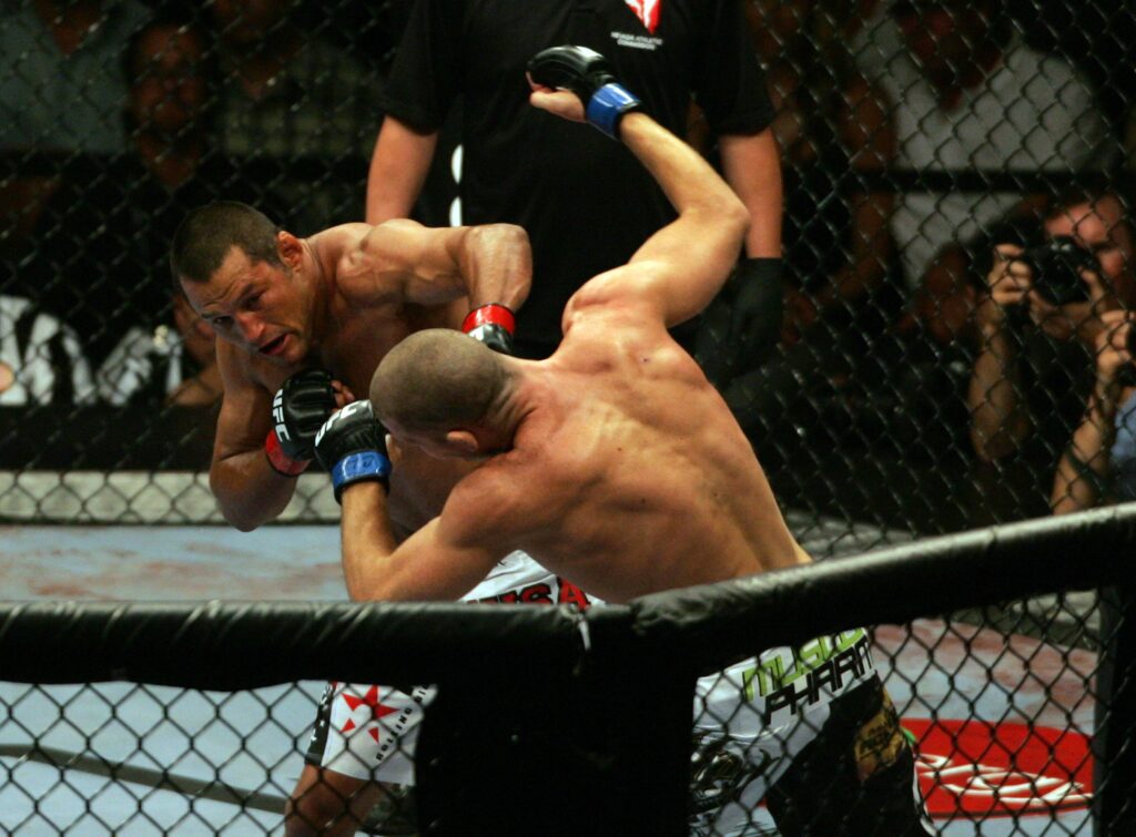 11 July 2009: Dan Henderson on left connects with a big left hand to Michael Bisping of Britain during their middleweight fight at the UFC 100 event at the Mandalay Bay Events Center in Las Vegas, NV. MMA: JUL 11 UFC 100 PUBLICATIONxINxGERxSUIxAUTxHUNxRUSxSWExNORxONLY Icon357090710230100 EDITORIAL USE ONLY