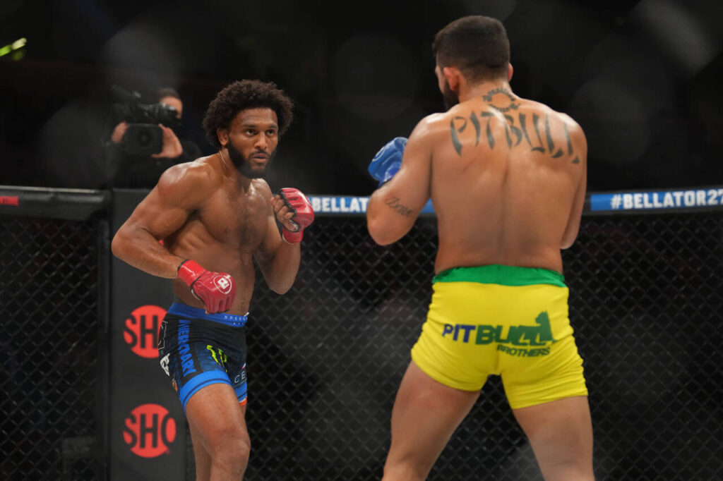April 15, 2022, SAN JOSE, San Jose, California, United States: SAN JOSE, CA - April 15: AJ McKee (red gloves) and Patricio Pitbull (blue gloves) meet in the octagon for a 5-round featherweight World Championship, WM, Weltmeisterschaft bout at the SAP Center for Bellator 277: McKee vs Pitbull 2 - Event on April 15, 2022 in SAN JOSE, United States. SAN JOSE United States - ZUMAp175 20220415_zsa_p175_185 