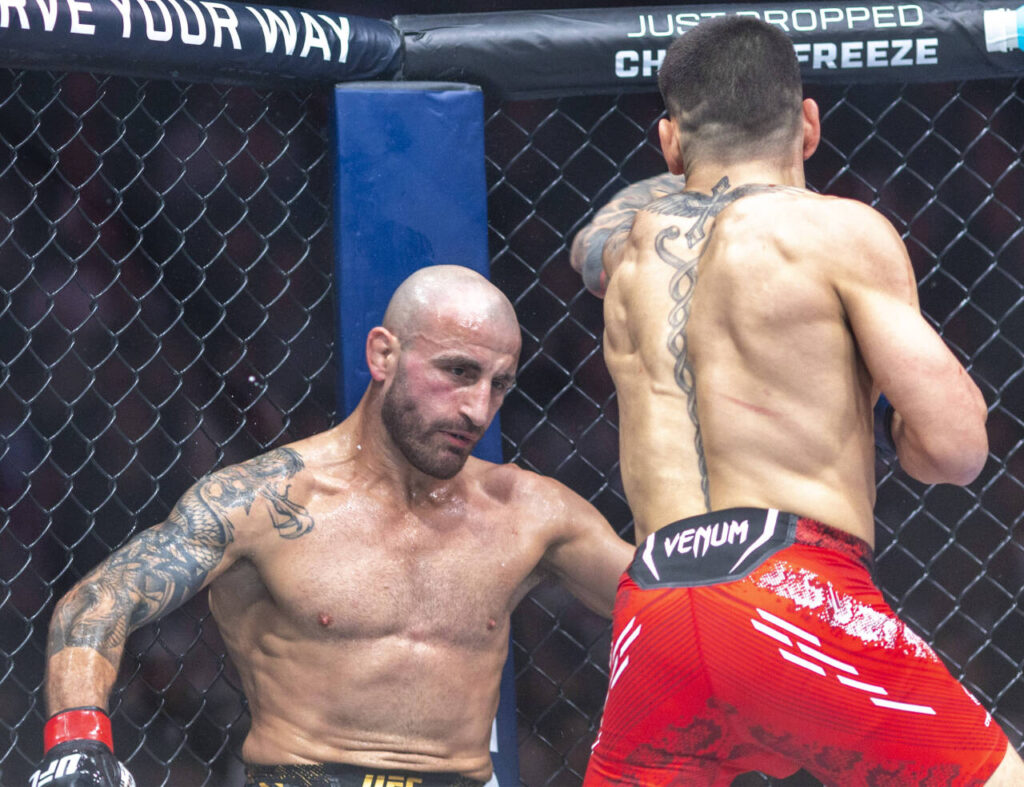 Alexander Volkanovski (L) and Spanish-Georgian Ilia Topuria (R) fight during UFC 298 at the Honda Center, Anaheim, California, 17 February 2024.